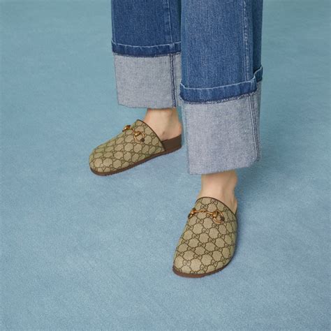 Gucci Women's GG Supreme Horsebit Slippers.